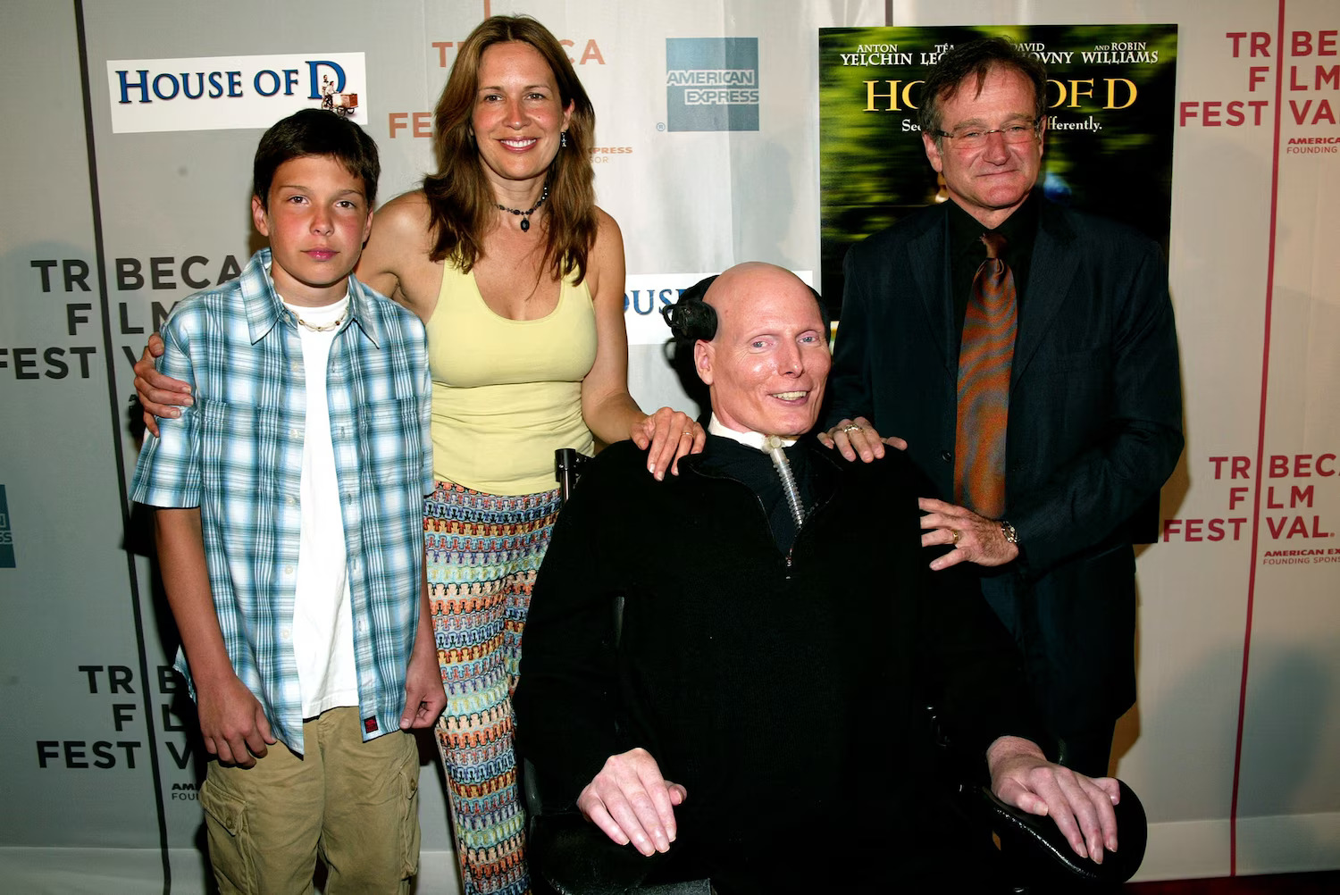 In this May 7, 2004, file photo, actor Robin Williams poses with actor Christopher Reeve, wife Dana Reeve and son Will at the screening of "House Of D" during the 2004 Tribeca Film Festival in New York.Evan Agostini/Getty Images, FILE